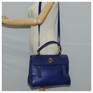 Yves Saint Laurent Muse Two bag in blue granulated calf leather with gold-tone